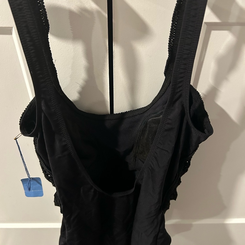 NWT. Elegant Black One-Piece Swimsuit. Crochet front.